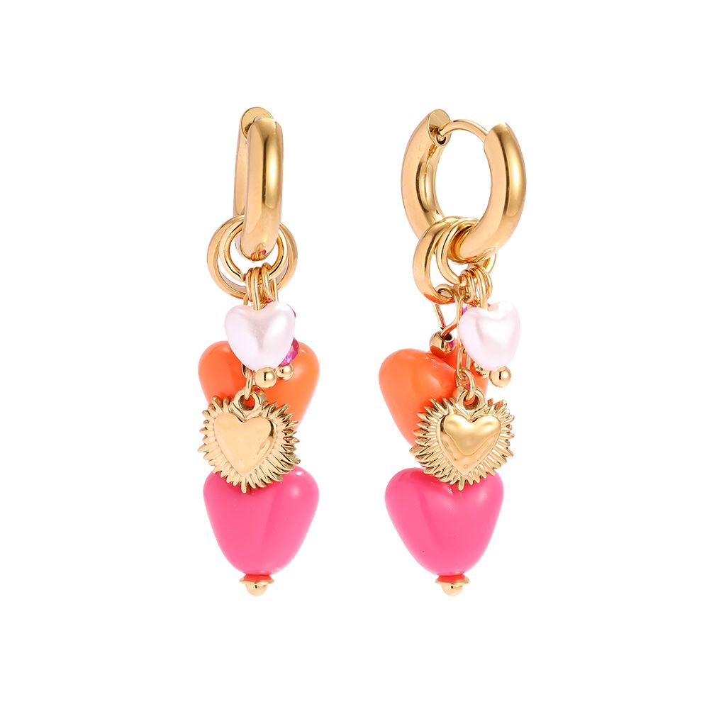 Pearl pink heart oorbellen