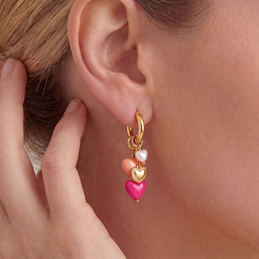 Pearl pink heart oorbellen